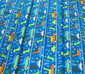 Camelot Fabrics Roarsome 21180403-02 Dinosaurs on the Go in Dark Blue